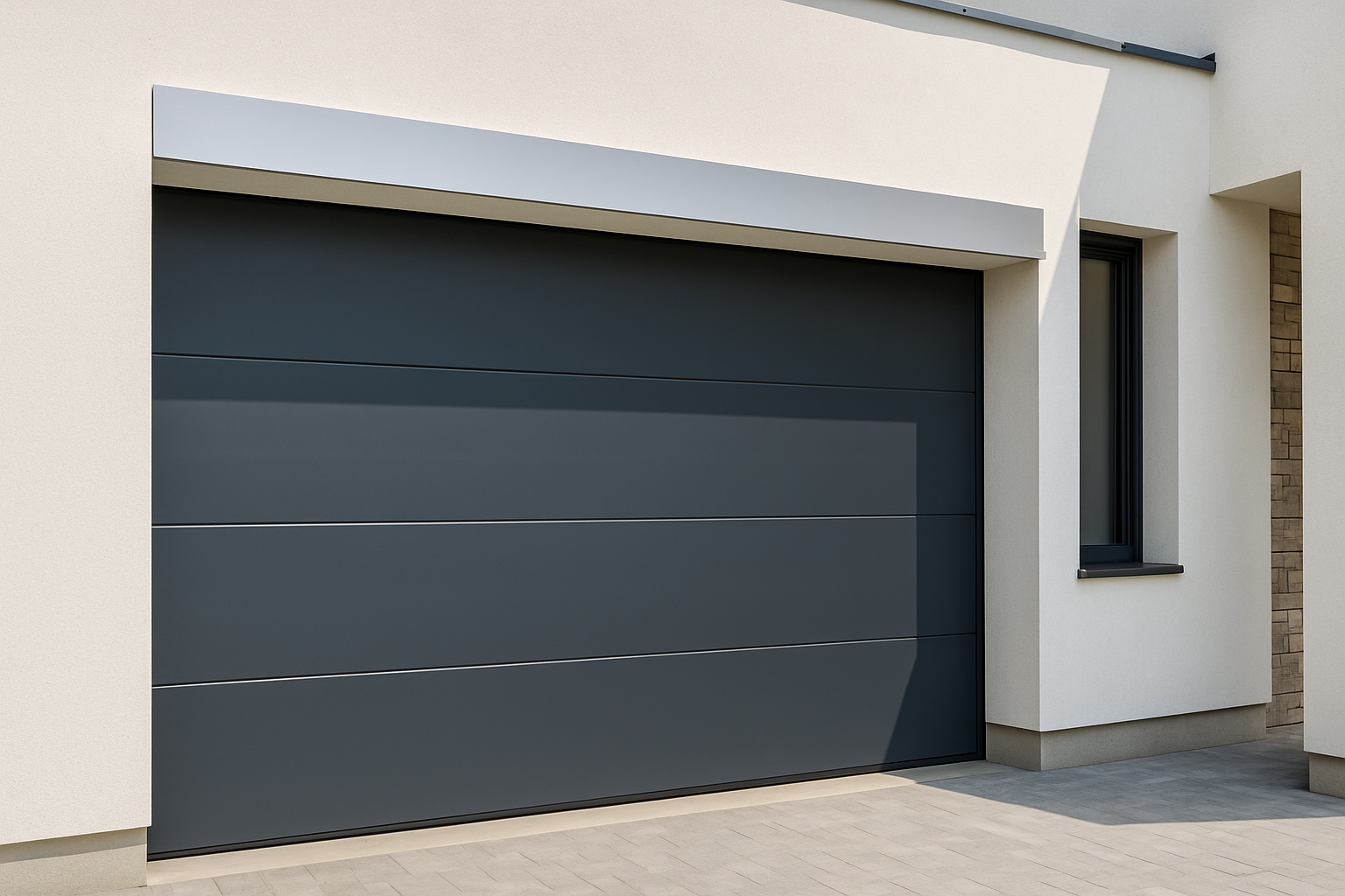 Porte de garage sectionnelle en aluminium installée par SMB Structure